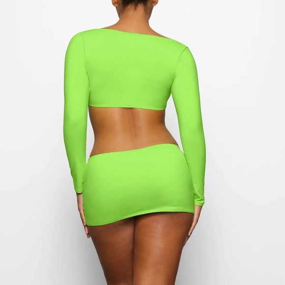 SKIMS Neon Green Long Sleeve Crop Top and Mini Skirt Set - Picture 2 of 9